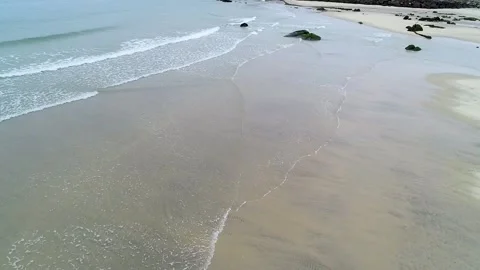 Calm ocean waves on an empty beach The Concept of mental wellness Stock Footage 334731892