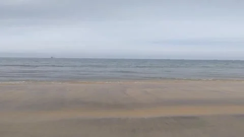Calm Ocean Waves on Empty Beach 4K Stock Footage Stock Footage 335957514