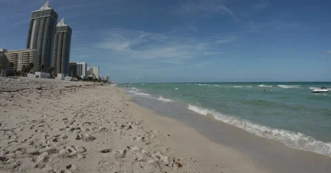 Calm ocean waves on Miami Beach - 4K Stock Footage 60648919