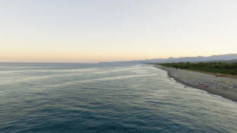 Calm ocean waves on sandy beach Stock Footage 248126177