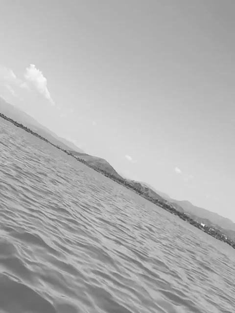 Calm Open Water and Distant Coastline View Stock Footage 341318619