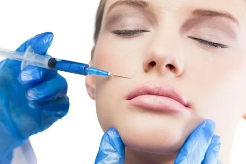 Calm pretty model having botox injection above the lips Fotos Stock