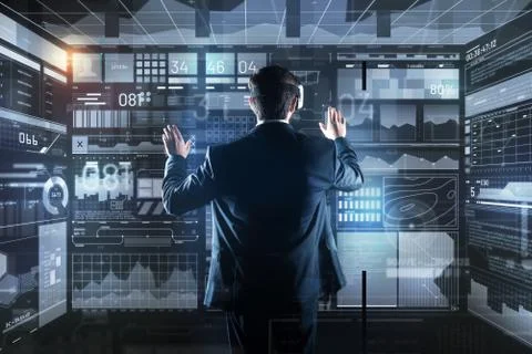 Calm programmer wearing virtual reality glasses while working Stock Photos