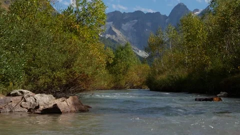 Calm river in the background of a landscape of mountains Stock Footage 139242445