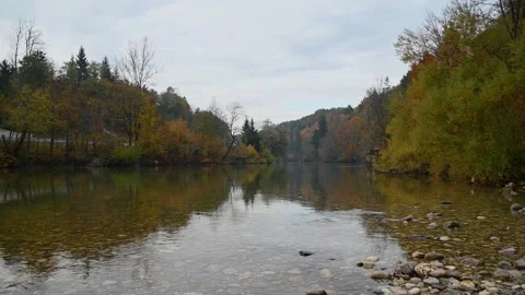 Calm river flowing in pristine alpine valley Stock Footage 171110452