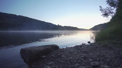 Calm river in mountains. View of the river of Vishera flowing in Ural Mountains  Video stock 163104858