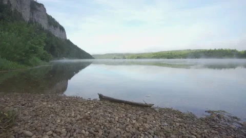 Calm river in mountains. View of the river of Vishera flowing in Ural Mountains  Video stock 163106878