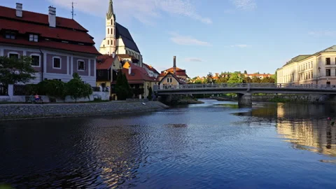 Calm River Reflections and Bridge in Český Krumlov Stock Footage 313387808