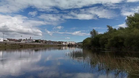 Calm River Reflections and Cloudy Sky 4K Stock Footage 333413400