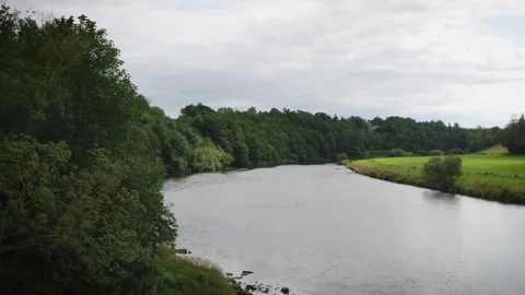 Calm river scene backdrop in slow motion stock footage Stock-Footage 315065241