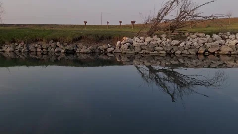 Calm river scene at sunset Stock Footage 302841030