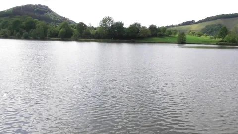 Calm Saar river on a cloudy spring evening Vídeo Stock 334452503