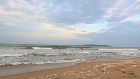 Calm sandy beach and gentle sea waves reflecting the beauty of nature balance Stock Footage 319738751