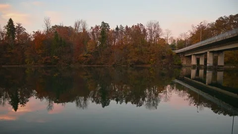 Calm Sava River flowing under concrete bridge Stock Footage 169370766
