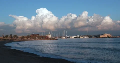 Calm Sea And Dramatic Looking Clouds at Barcelona Harbour 4K Stock Footage 131566272