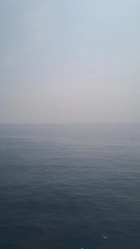 Calm sea with cloudy sky in the background Stock Footage 280340258