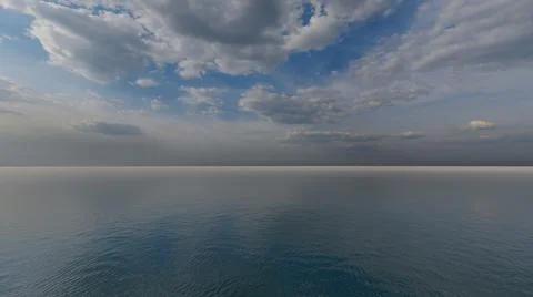 Calm sea with cloudy sky Stock Illustration