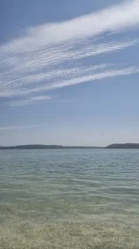 Calm sea horizon with dramatic cloud sky Stock Photos