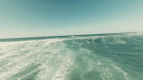Calm sea meets sky with soft waves Stock Footage 341821923
