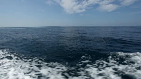 Calm sea or ocean view from a small boat moving on the waves Stock Footage 103647589