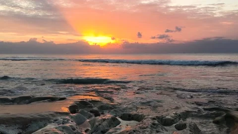 Calm sea with sunset sky and sun through the clouds over. Tranquil seascape Stock Footage 239187766