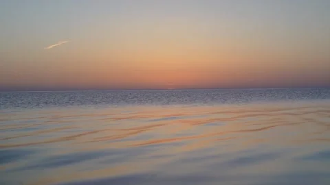 Calm sea surface after sunset, mode lighting Stock Footage 149693449