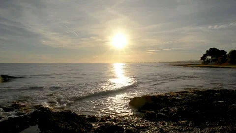 The calm sea in a very cloudy sunset Stock Footage 83462600
