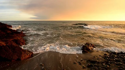 The calm sea in a very cloudy sunset in Spain Stock Footage 83894802