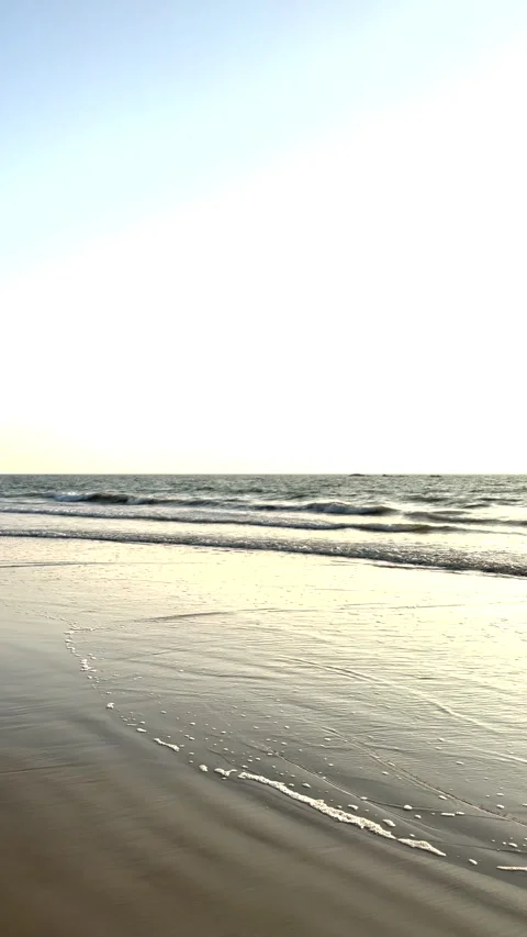 Calm Sea Waves Rolling onto Shore – Vertical Shot 스톡 동영상 332553540