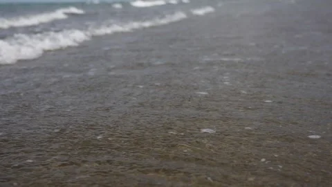 Calm sea waves splashing, close-up. Ocean water surface Stock Footage 284083168