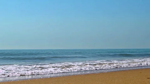 Calm Sea Waves Splashing on Sandy Beach Shore Stock Footage 333076947