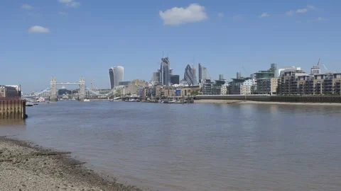 Calm shore of Thames river and central London across the river. Stock Footage 117168843