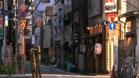 A Calm Side Street with Small Stores in Tokyo Japan Stock Footage 720383