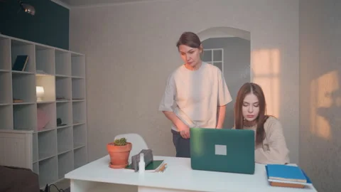 Calm study environment with dedicated educator aiding student. Peaceful room Stock Footage 341976838