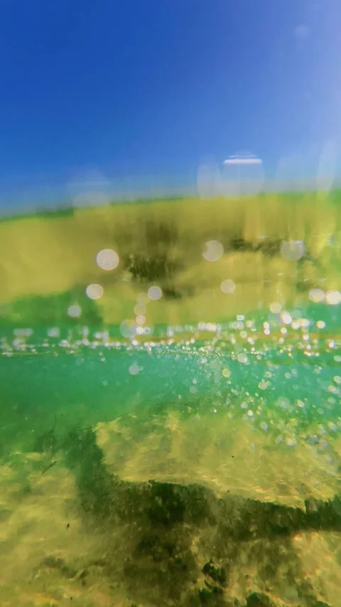 Calm summer sea waves rising over Stock Footage 342745565