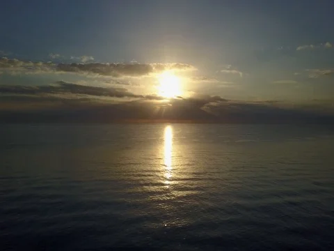 CALM SUNRISE AT SEA DRAMATIC APPROACH Stock Footage 70848377