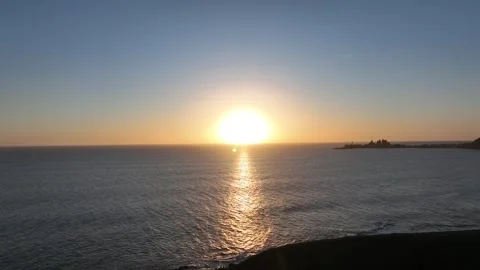 Calm Sunset Over Atlantic Ocean with Distant Pier – Gran Canaria Aerial Stock Footage 309940521