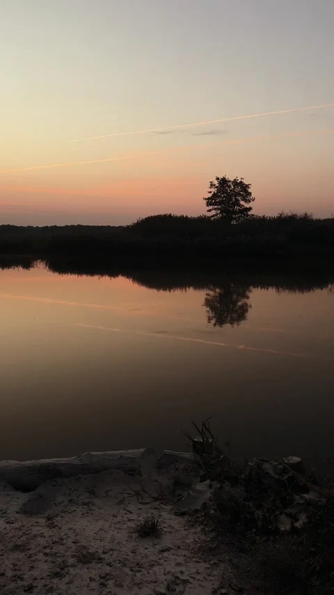 A calm sunset over the lake Stock Footage 317781845