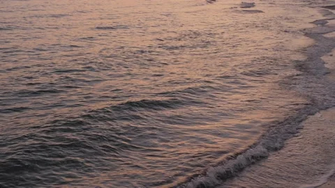 Calm sunset sea view waves background Stock Footage 143702546