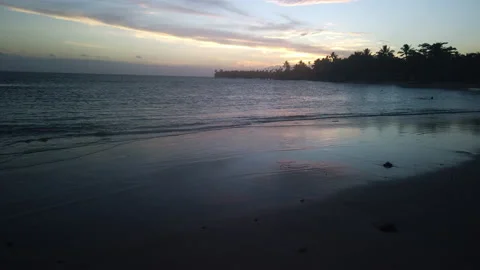 Calm sunset in slow motion on a beach in Samoa Stock Footage 131790211