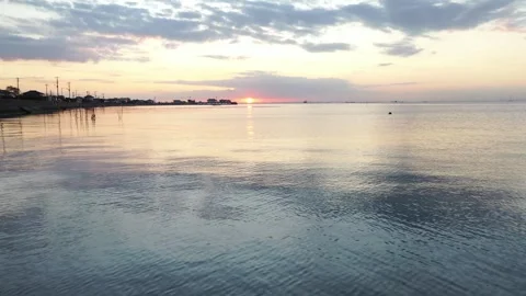 Calm Sunset Waves at Crystal Clear Sea Stock Footage 307912199