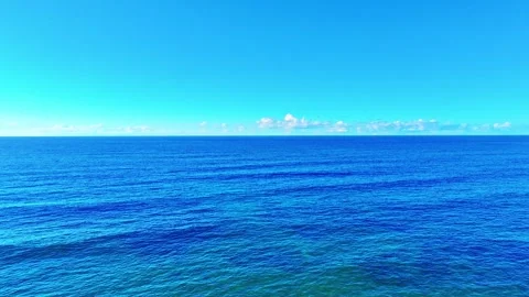 Calm surface of the Atlantic Ocean with big waves on a sunny summer day. Stock Footage 293722291