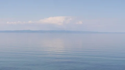 The calm surface of a clear lake Stock Footage 103412811