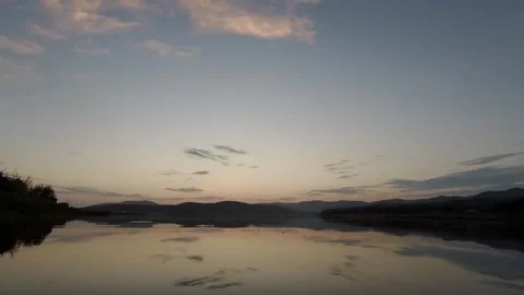 Calm surface of the lake at sunset Stock Footage 162516963