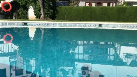 Calm surface of the pool Stock Footage 132572392