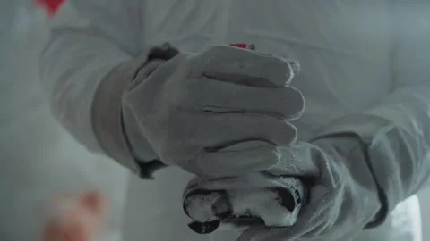 Calm technician ensures sample transfer safety. Precise field technician Stock Footage 346470714