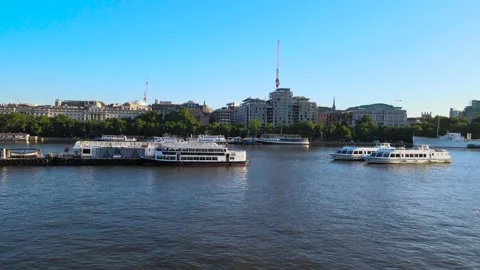 Calm Thames river flowing through town in morning Video stock 157459288