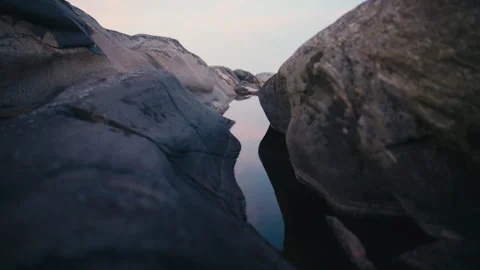 Calm Tide Pool Between Smooth Coastal Granite Rocks Stock Footage 341071031