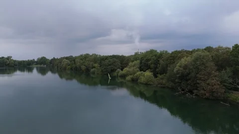 Calm Tree Lined Lake Reflection Aerial View 스톡 동영상 343026498