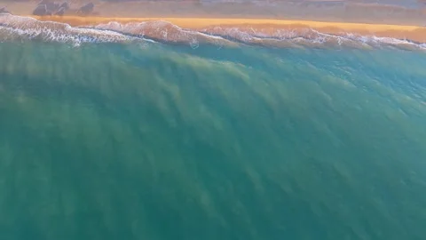 Calm turquoise sea surface texture captured from aerial drone Stock Footage 325720195